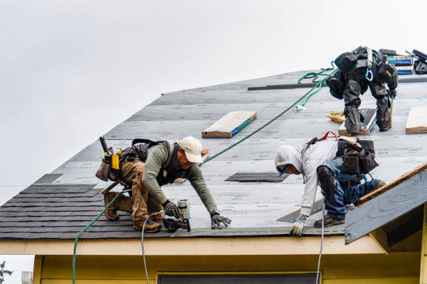 Professional Flat Roof Repair technician working in South Lancaster, MA